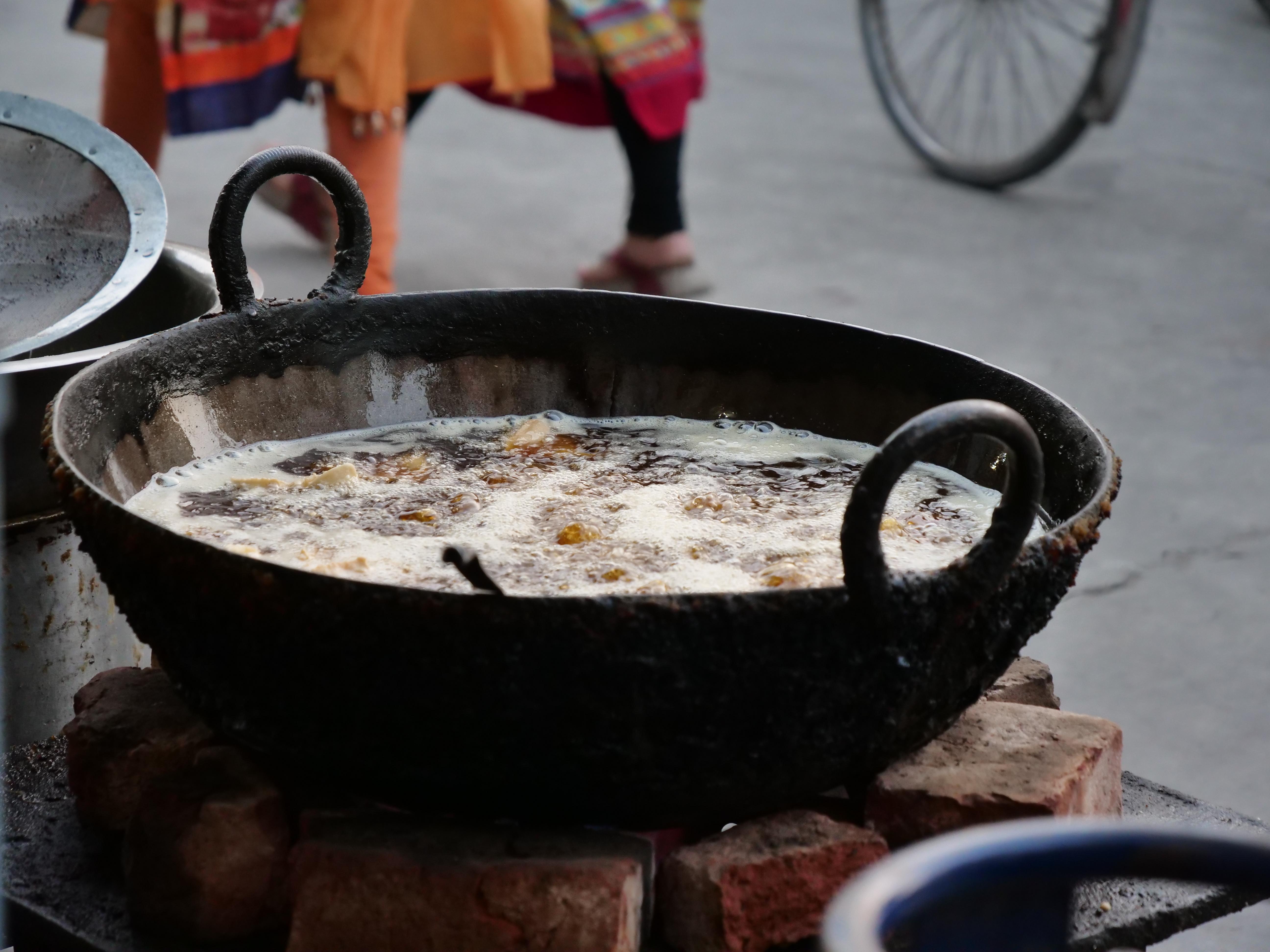 Pot cooking over open fire in India